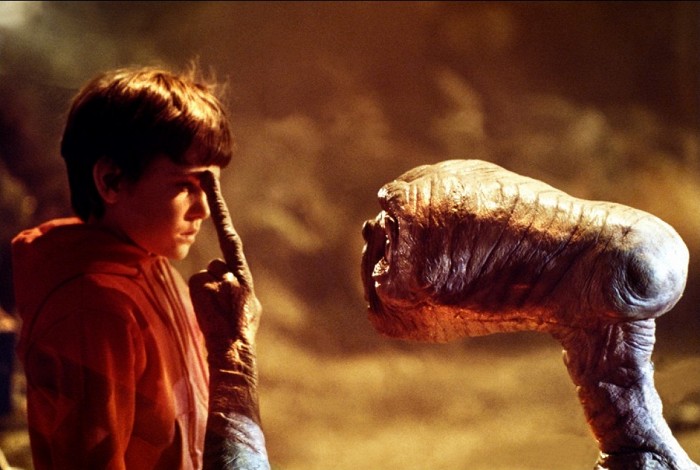 E. T.
